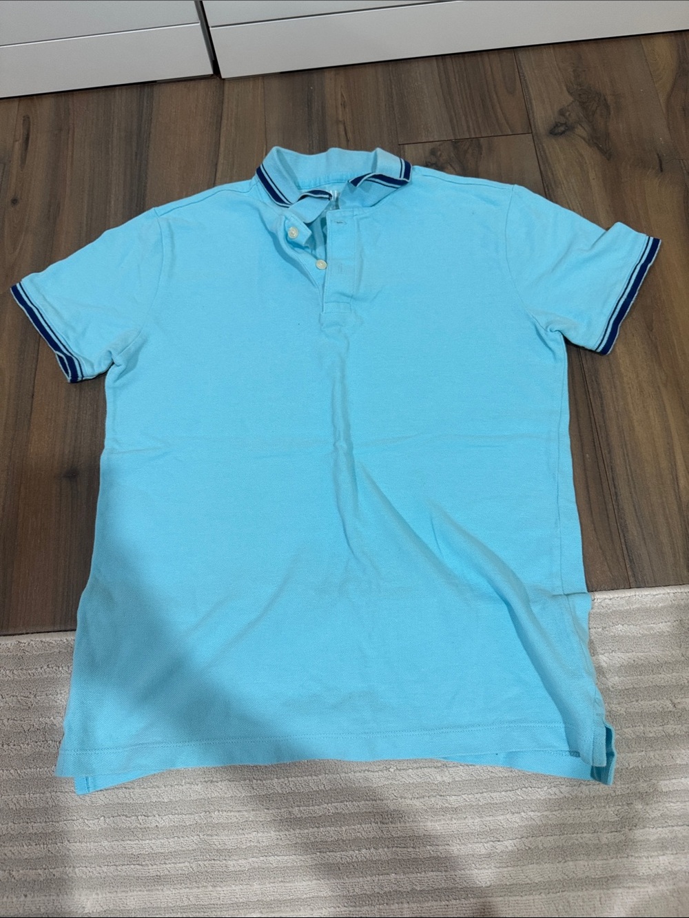 light blue men's polo from GAP size small